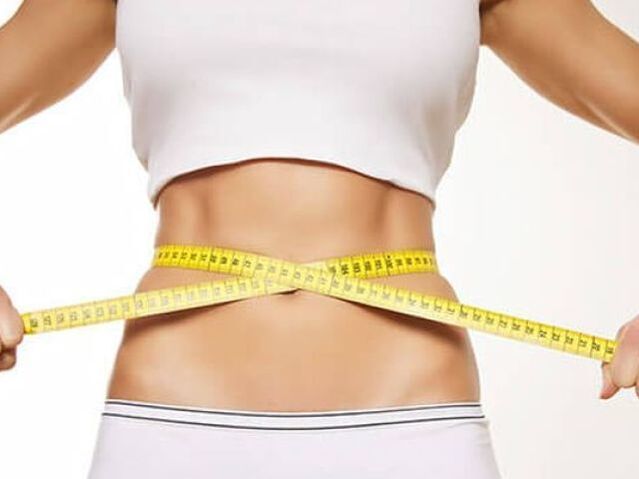 The waist at the waist with a centimeter ribbon